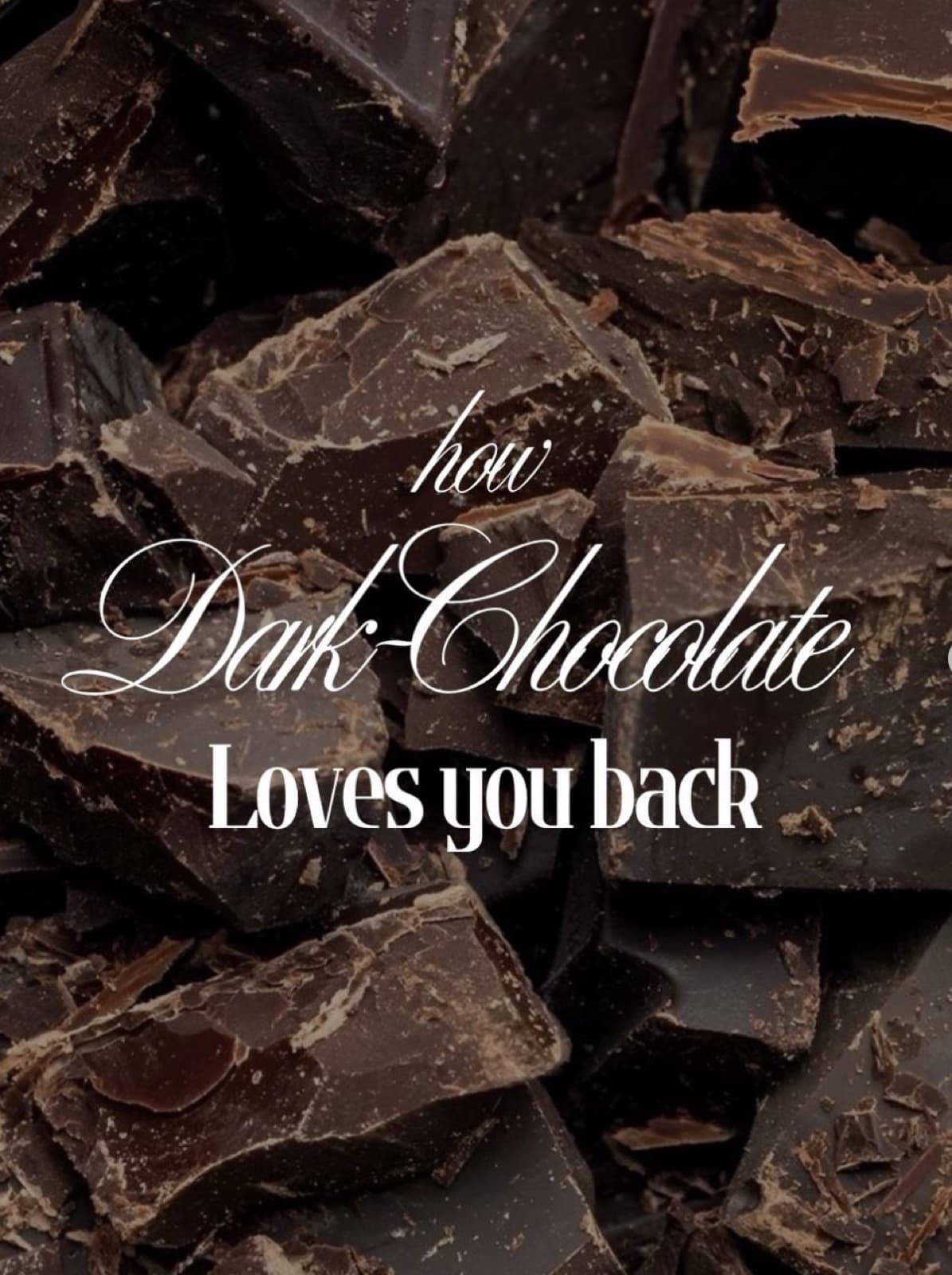 Rough chunks of broken dark chocolate filling the frame edge to edge